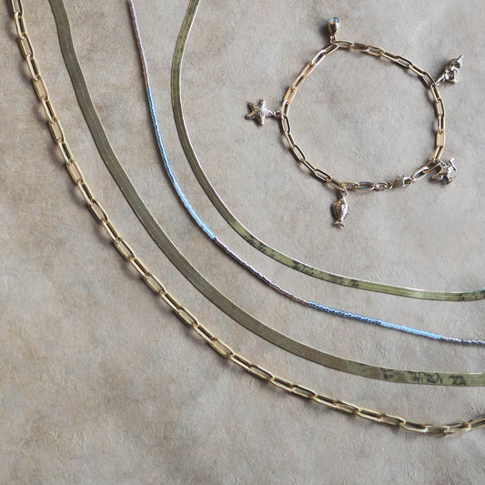 The Noosa Charm Bracelet in Yellow Gold