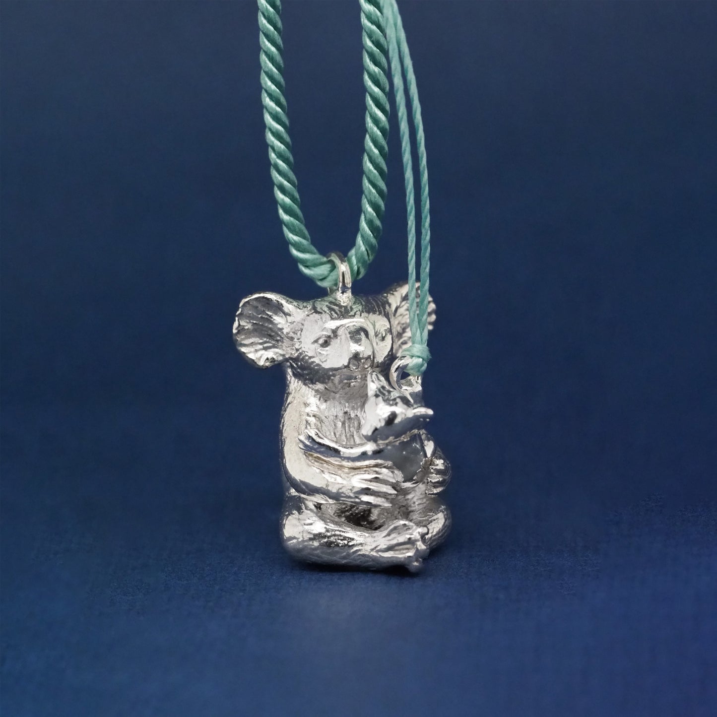 Mama Koala and Joey set in Sterling Silver