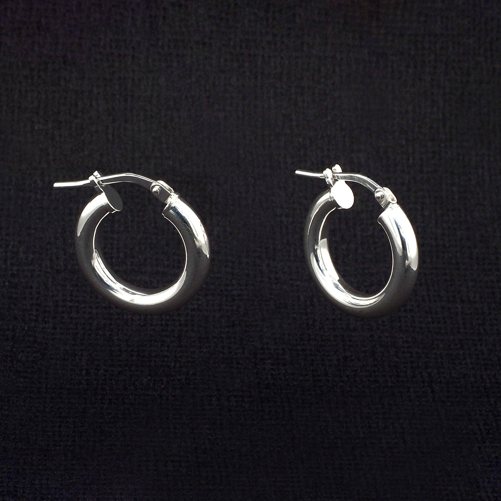 Ladies silver online hoop earrings