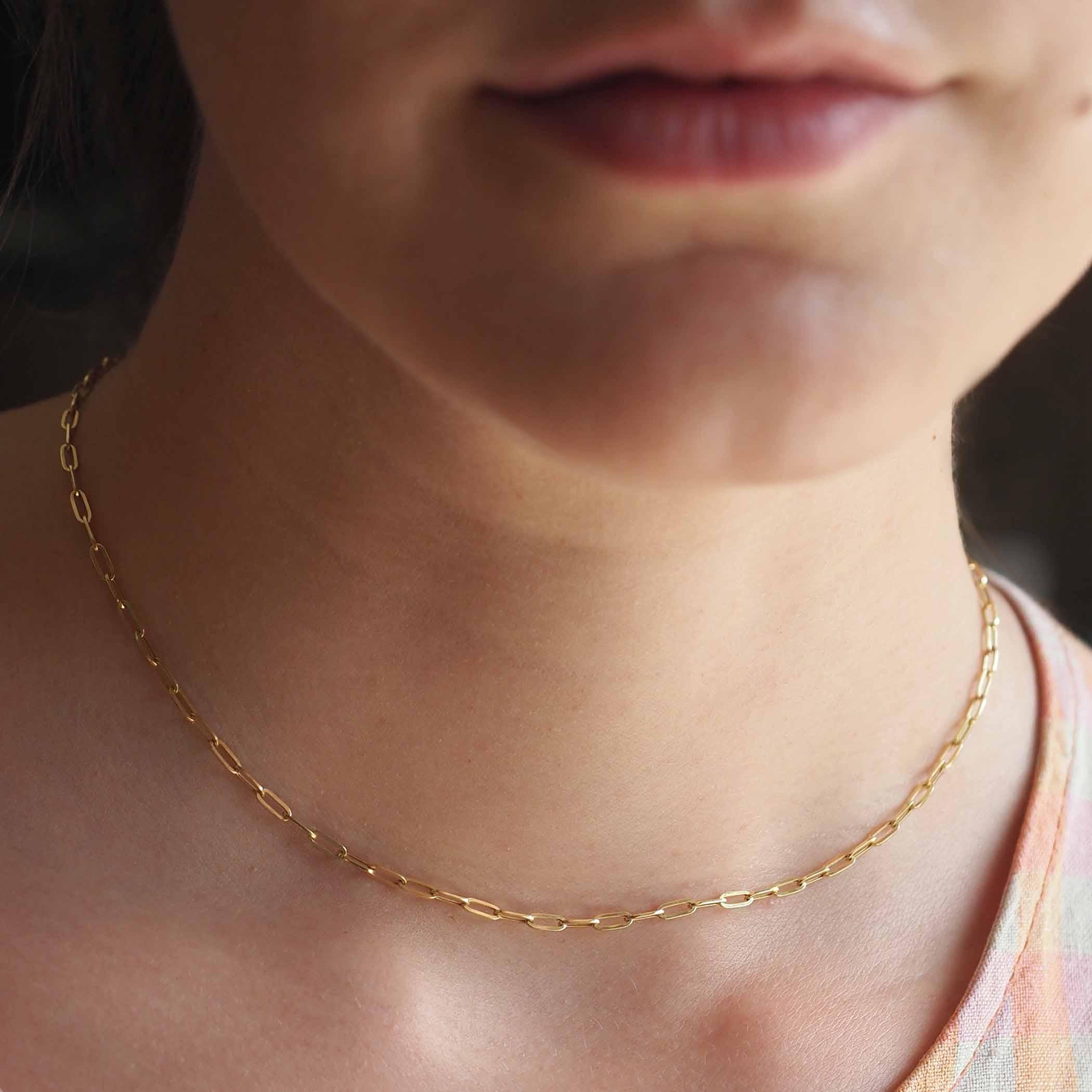 Gold paperclip store chain necklace